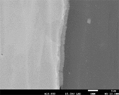 接合界面に暑さ1μm未満の金属間化合物相がフィルム状に生成